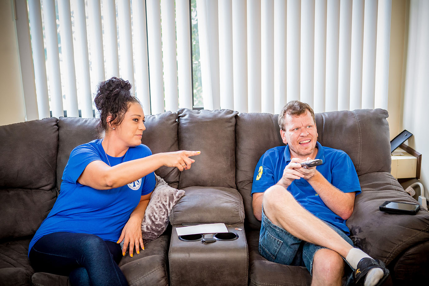 man and woman on couch together